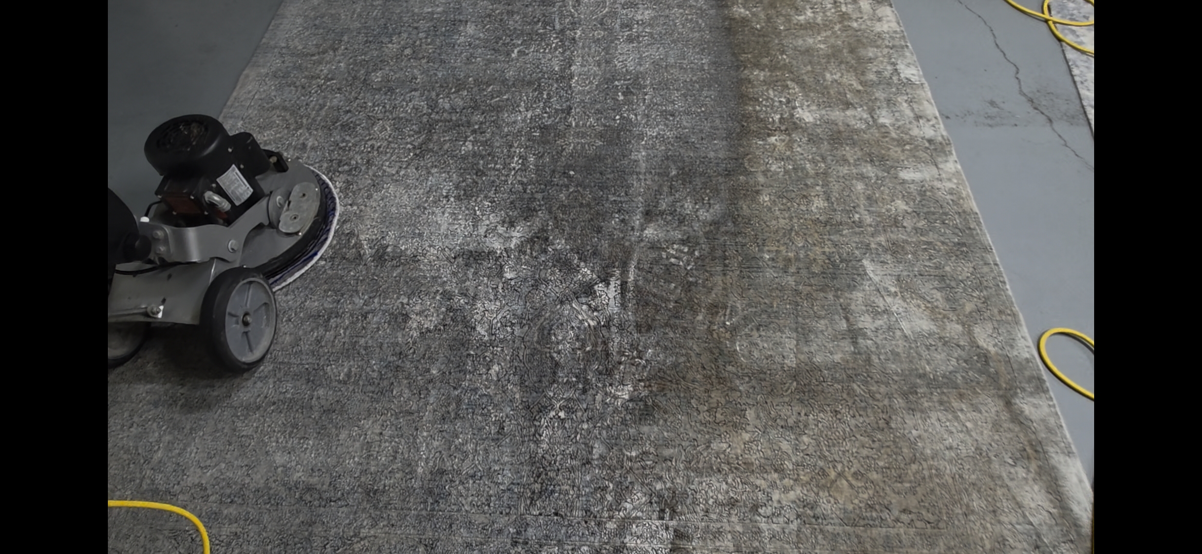 Before and after rug cleaning by Granbury Carpet Cleaning.